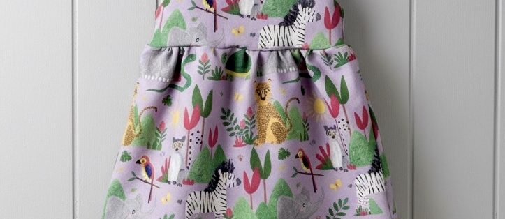 Colourful jungle print baby pinafore dress from Rabbit and Hare